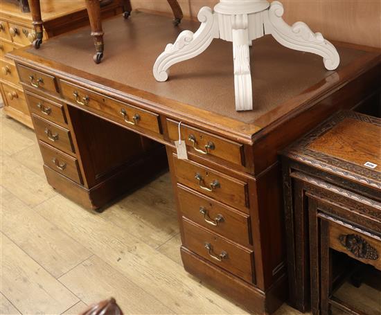 An early 20th century mahogany pedestal desk W.152cm